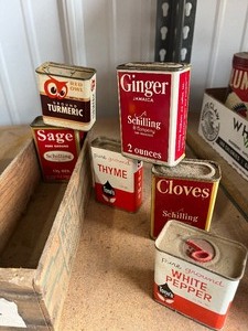 lot 52 image: Wood Box  full of spice tins