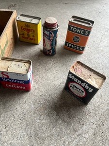 lot 53 image: Wood Box  full of spice tins