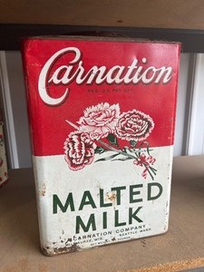 lot 12 image: 25 lb Carnation Malted Milk Tin