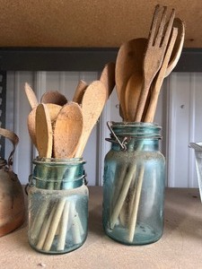 lot 22 image: 2 blue Jars with Wood Utensils
