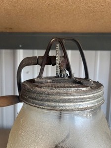 lot 24 image: Glass Butter Churn