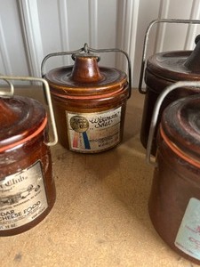 lot 36 image: 4 cheese crocks