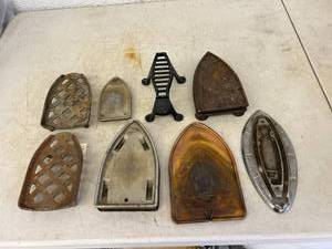 lot 107 image: Iron Trivets