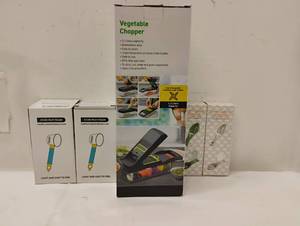 lot 40 image: NEW VEGETABLE CHOPPER, FRUITVEGETABLE PEELER AND FISH SCALE SCRAPER WITH COVER
