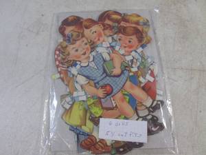 lot 129 image: (CNTR) Pack of Vintage Paper Dolls - 6 Dolls  54 Outfits