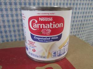 lot 187 image: (C-1) Case 24 Cans Carnation Evaporated Milk Past Date