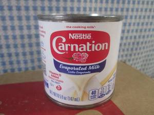 lot 188 image: (C-1) Case 24 Cans Carnation Evaporated Milk Past Date