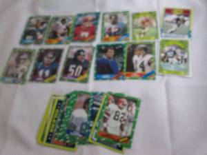lot 159 image: Assorted 1986 Topps Football Cards...