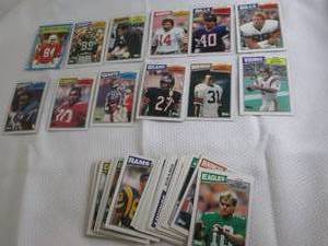 lot 64 image: 1987 Assorted Topps Football Cards...