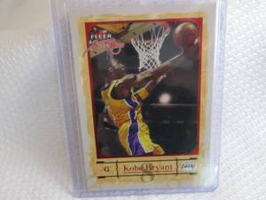 lot 102 image: 2004-05 Fleer Kobe Bryant Card...