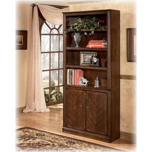Opened Signature Design Ashley Furniture Bookcase (dark brown)
