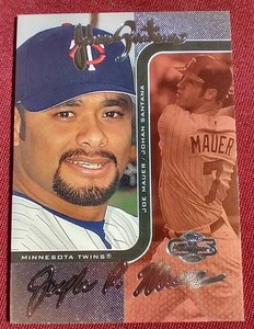 lot 39 image: 2006 Topps Johan SantanaJoe Mauer Card - #d100