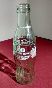 lot 45 image: 2001 UND Sioux Football Championship Coke Bottle