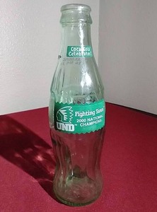lot 189 image: 2000 UND Sioux Hockey Champions Coke Bottle