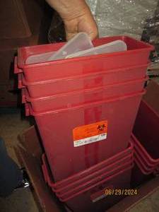 12 red cans with covers...