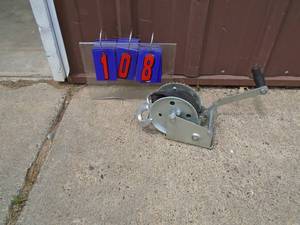 Boat winch with strap. As shown.