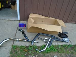 Misc motorcycle exhaust parts & air cleaner. As shown.