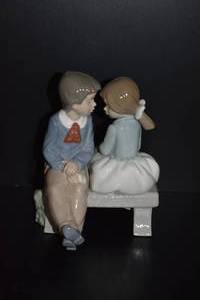 lot 9 image: Lladro NAO First Love Figurine