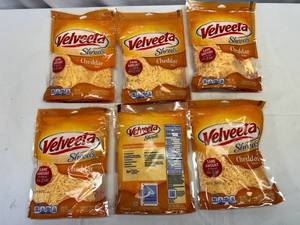 lot 76 image: G. 6x 8oz Velveeta Shreds-Cheddar Flavor