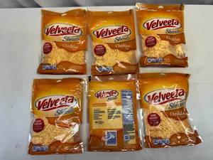 lot 77 image: G. 6x 8oz Velveeta Shreds-Cheddar Flavor