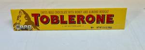 lot 273 image: II. 12.6oz Large Toblerone Swiss Chocolate with Honey & Almond Nougat