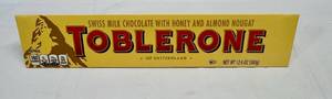 lot 277 image: II. 12.6oz Large Toblerone Swiss Chocolate with Honey & Almond Nougat