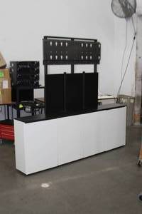 lot 3 image: Salamander Designs 4-Bay Low-Profile Wall Mount Large Flat Panel Monitor  Display  TV  Television Cabinet - MSRP $4,000
