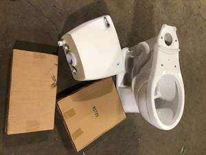 Delta Foundations 2-Piece 1.28 GPF Single Flush Round Toilet in White  Customer Returns See Pictures