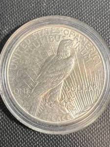 lot 59 image: 1935 US PEACE SILVER DOLLAR IN AIRTITE