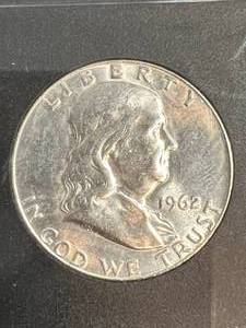 lot 79 image: 1962 US FRANKLIN HALF DOLLAR GENUINE UNC SLABBED