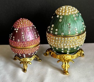 lot 100 image: Two Bedazzled Egg Trinket Boxes on Gold Colored Stands