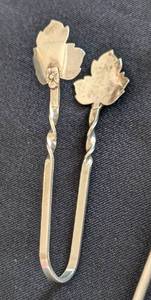 lot 82 image: Sterling Silver Leaf Stir Straws and Tongs