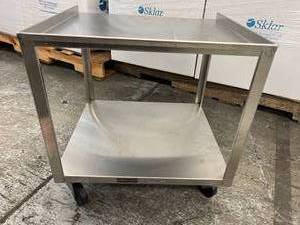lot 14 image: Chattanooga MB Stainless Steel Mobile Stand Cart Tall - designed to be used to transport stationary heating, ultrasound, or electrotherapy units 19 x 19 x 17 - In Good Condition