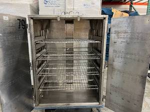 lot 17 image: MSRP $5500 Censitrac CPC Heavy Gauge&nbspStainless Steel Closed Case Cart with Passive Lock & 4 Shelves - Engineered For A Sterile, Quiet, Efficient Surgical Environment - Built To Last More Than A Lifetime Good Condition