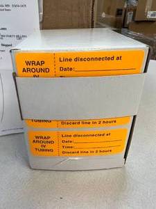 lot 57 image: MSRP $300  1 Case (12 each boxes) NEW Wrap Around IV Tubing Label Rolls