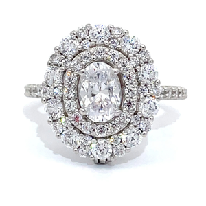 lot 36 image: Cubic Zirconia Oval Halo Cluster Vintage Style Ring VIDEO