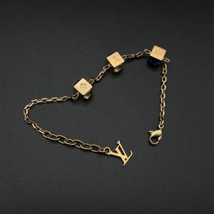 lot 22M image: Louis Vuitton Authentic Designer Gold Bracelet Crystal Gamble 7 12 Bracelet $750 Retail