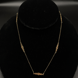 lot 22 image: Vintage Style Ribbon Fancy Filigree Link Necklace in 14k Yellow Gold