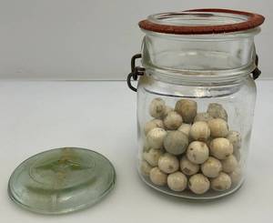lot 11 image: Antique Clay Marbles In Jar
