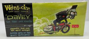 lot 16 image: 2006 Hawk Model CO. Weird-Ohs Car-Icky-tures DAVEY  The Way Out Cyclist (Factory Sealed)