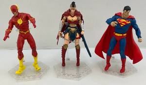 lot 21 image: Misc. Vintage Mcfarlane DC Multiverse 7 Action Figures