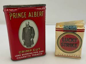 lot 41 image: Collectible Prince Albert Tobacco Tin & 1940s LUCKY STRIKE Cigarettes (Sealed) With Wisconsin Tax Paid Stamp On Bottom