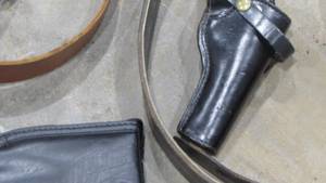lot 21 image: Ammo Belts and Holsters Lot