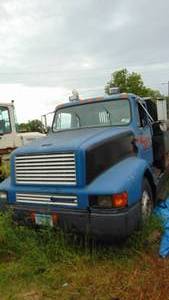 1995 International 8200 Dump Truck with 256,000 Miles, New Tires (contents not included in back of truck)