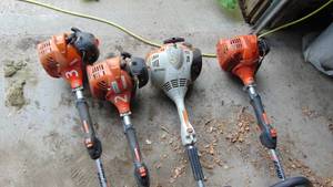 3 Echo SRM 225 and 1 Stihl FS56RC Straight Shafted Trimmers For Parts or Repair