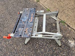 lot 52 image: Black & Decker Workmate 225 Portable Project Table - One leg is a little funky