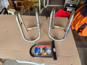 lot 54 image: Motorcycle Wheel Chocks and Bike Lock