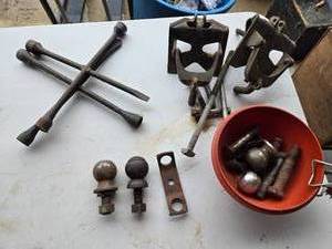 lot 58 image: Hitch Balls, 4 Way Tire Irons, Sway Bar Brackets