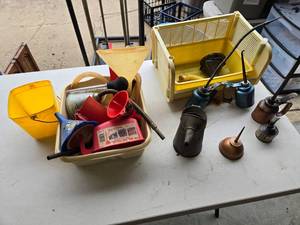 lot 76 image: Funnels  and Oil Cans