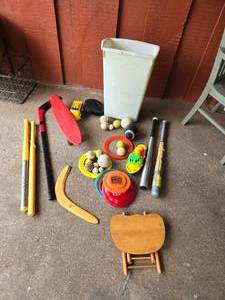 lot 122 image: Bats, Balls, and Other Sporting Goods Items